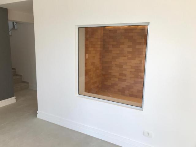 Adega com vista para a sala