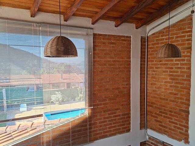Vista para piscina e espaço gourmet casa 3